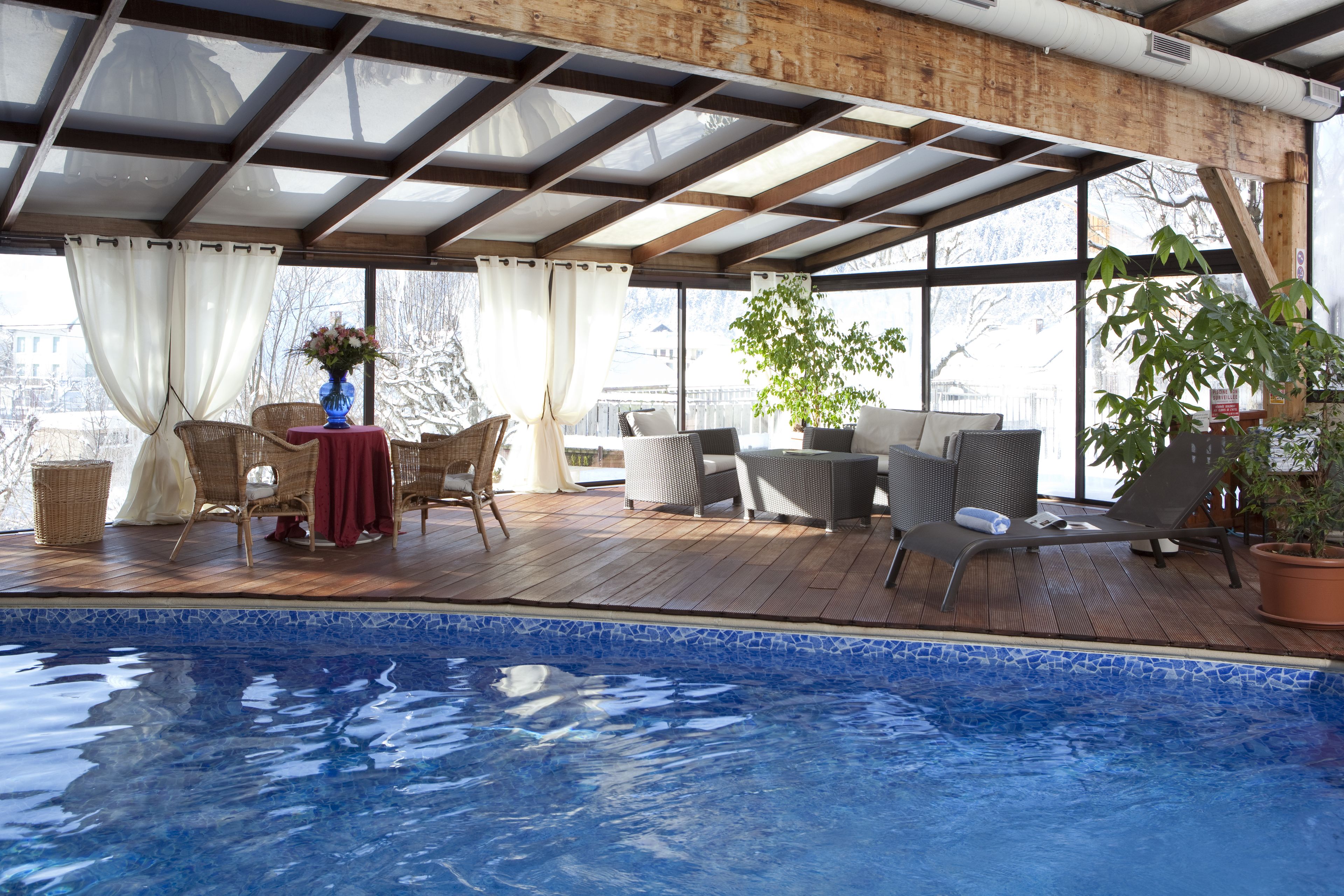 indoor pool, open 8:00 am to 7:30 pm, pool umbrellas, pool loungers