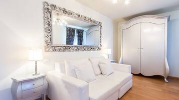 Superior Apartment, Canal View | Living area | 32-inch flat-screen TV with digital channels, TV