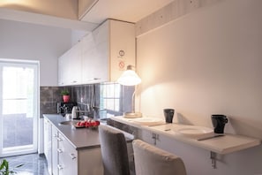 Fridge, microwave, stovetop, cookware/dishes/utensils