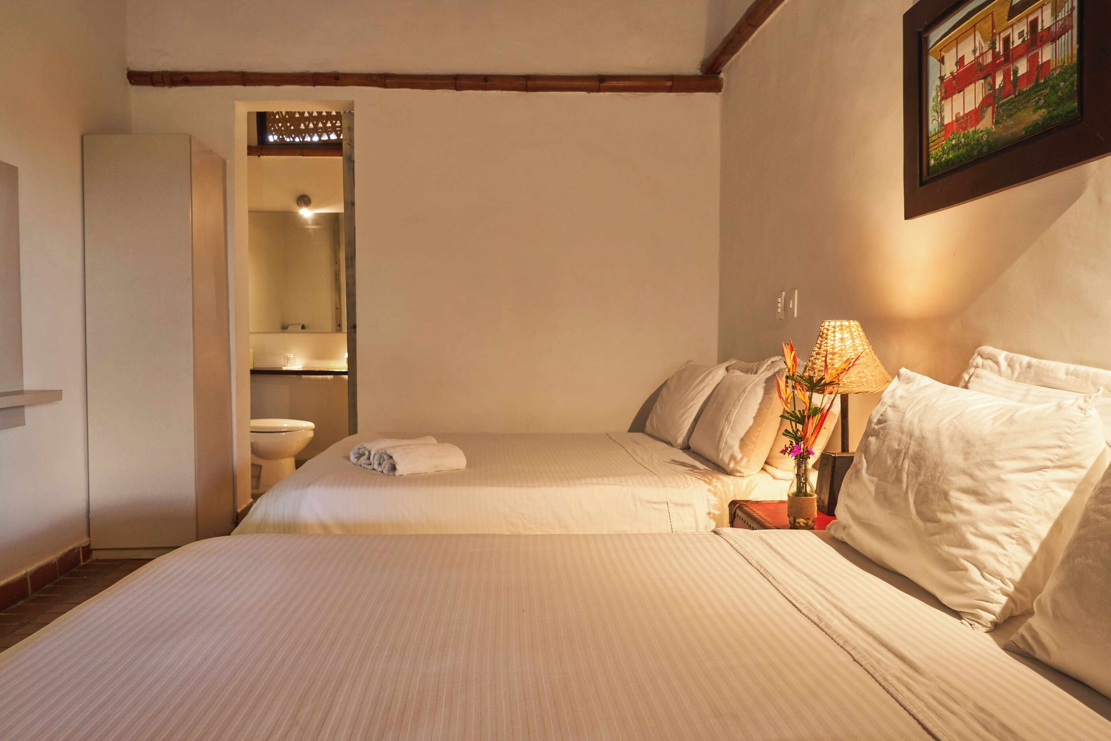 deluxe quadruple room | 1 bedroom, down duvets, in-room safe, free wifi