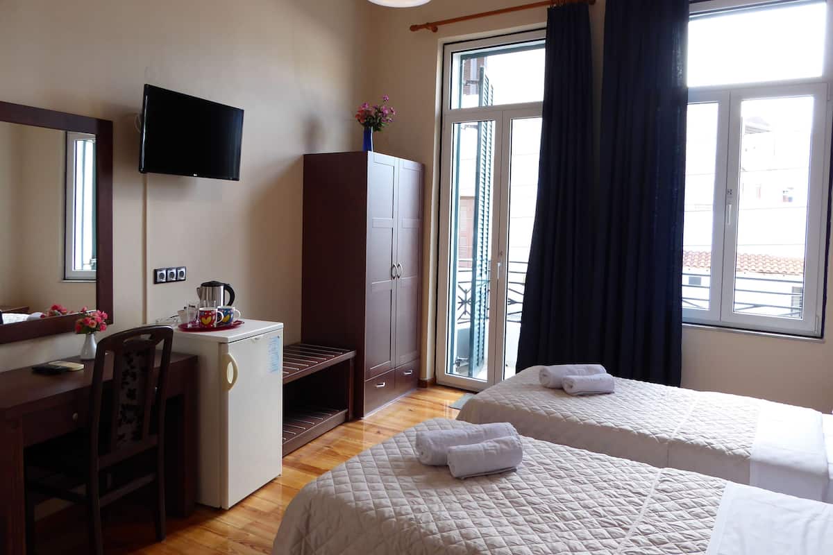 Standard Room, City View | 1 bedroom, in-room safe, desk, blackout drapes