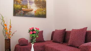 Appartement | Coin séjour | Télévision à écran plat de 32 pouces avec chaînes par satellite