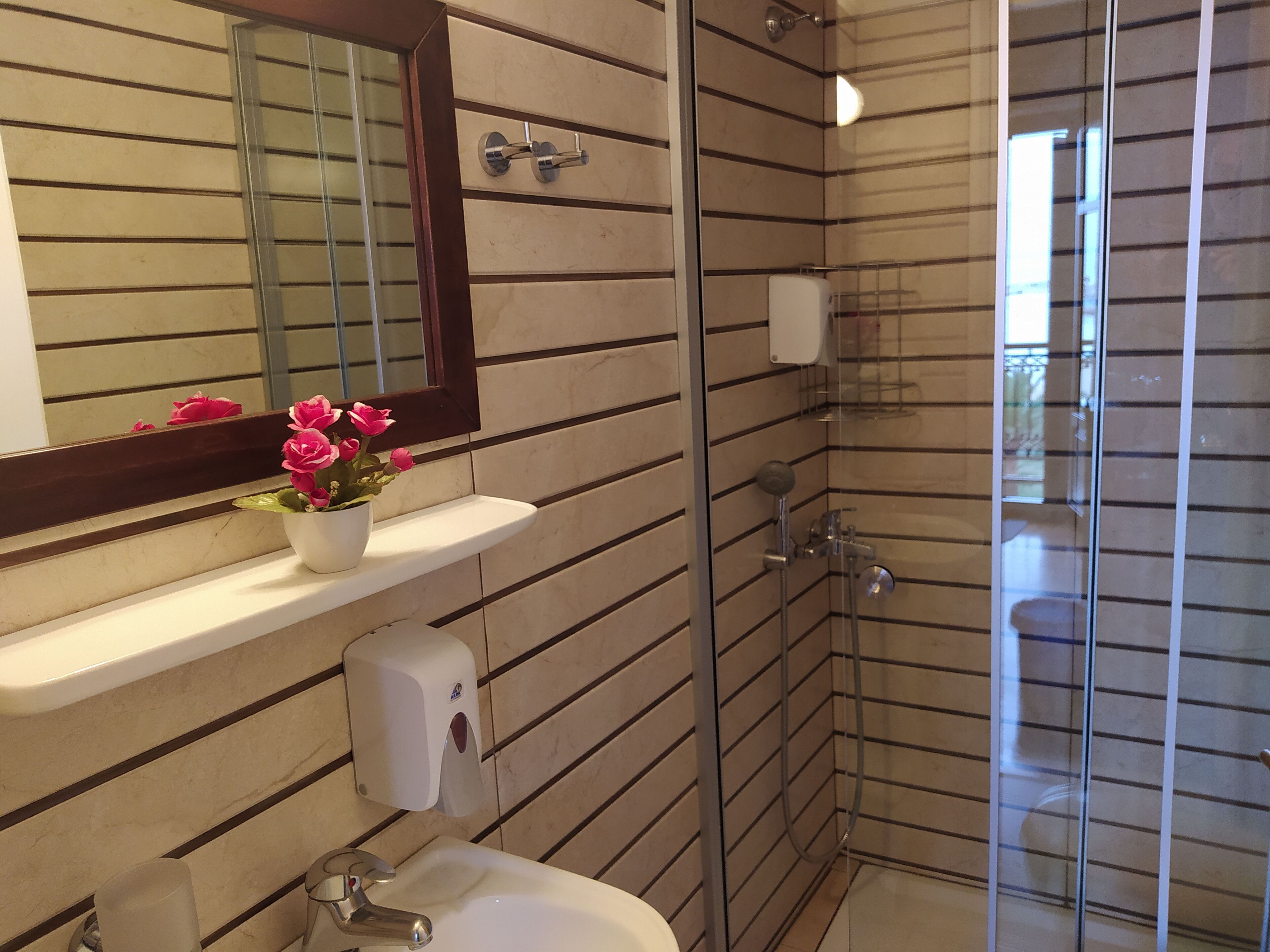 superior double room, sea view | bathroom | shower, rainfall showerhead, free toiletries, hair dryer