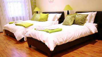 Habitació triple | Roba de llit d'alta qualitat i matalassos de la marca Select Comfort