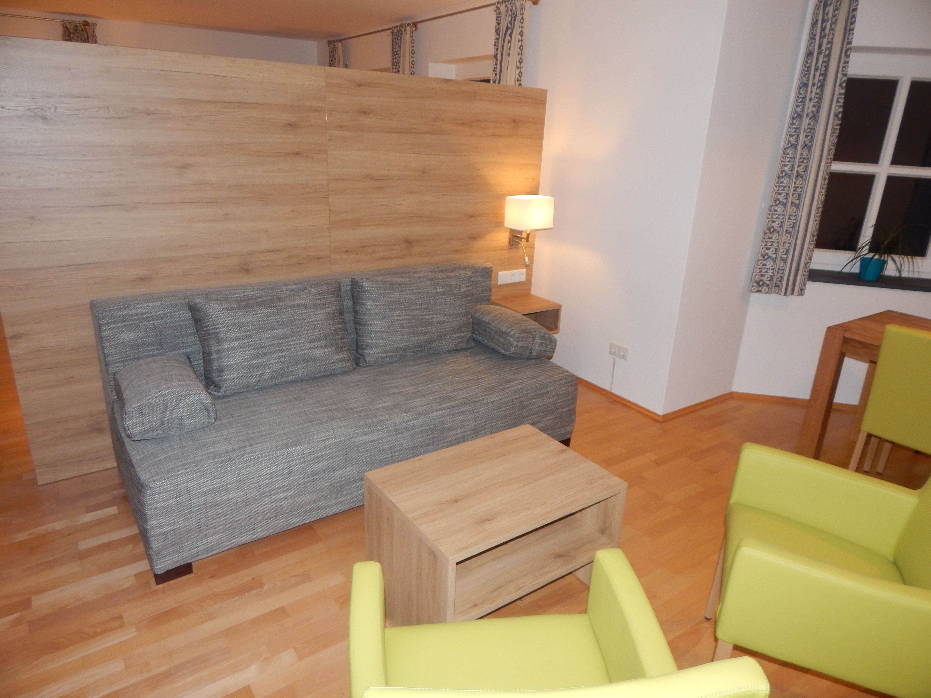 junior suite | living area | flat-screen tv