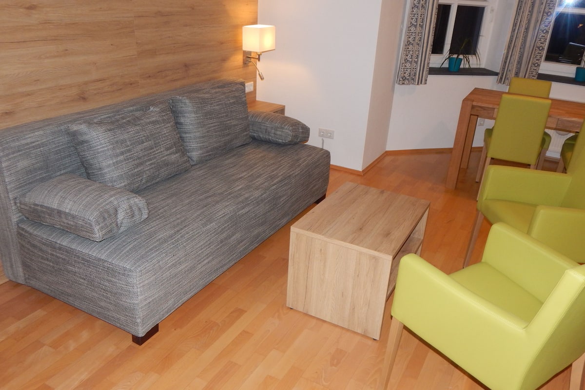 Junior suite | Woonruimte | Een flatscreentelevisie