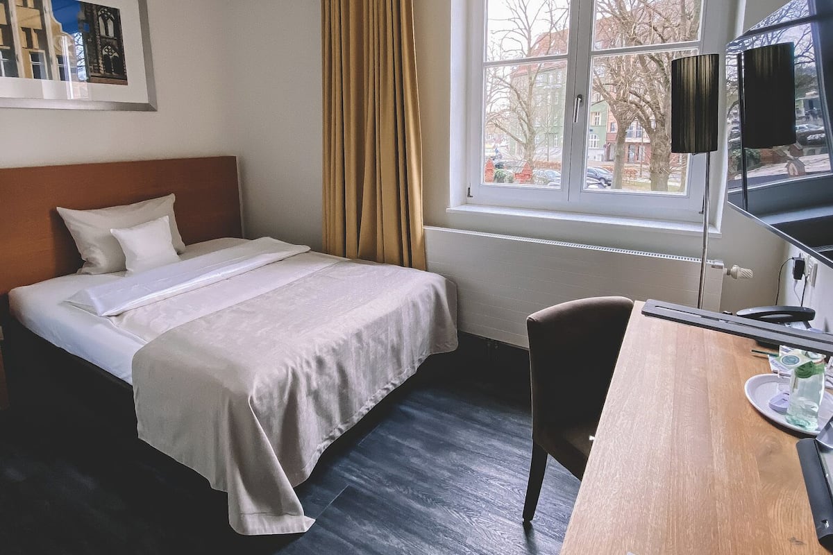 Single Room, City View | Minibar, in-room safe, desk, laptop workspace