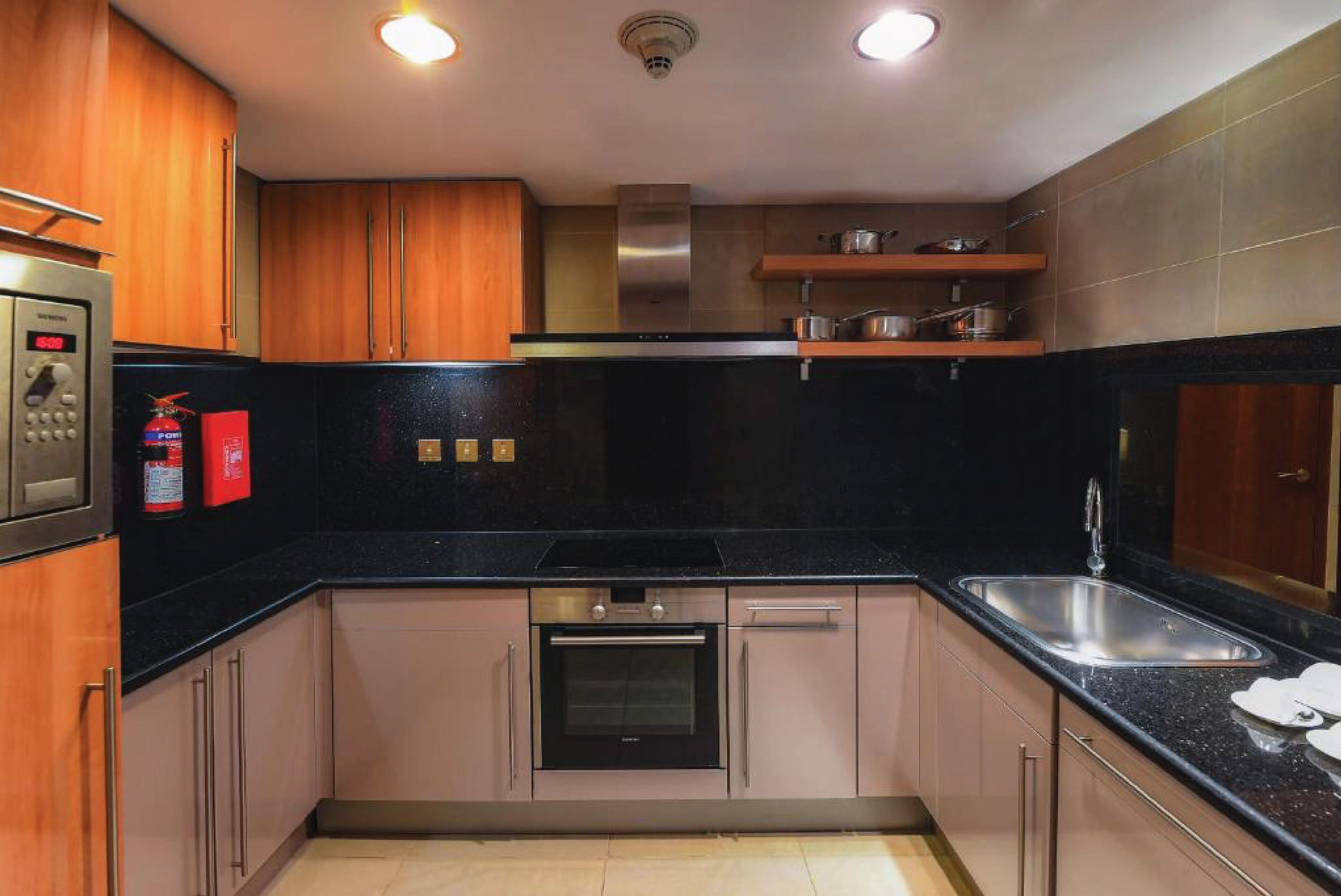 espresso maker, coffee/tea maker, electric kettle, paper towels