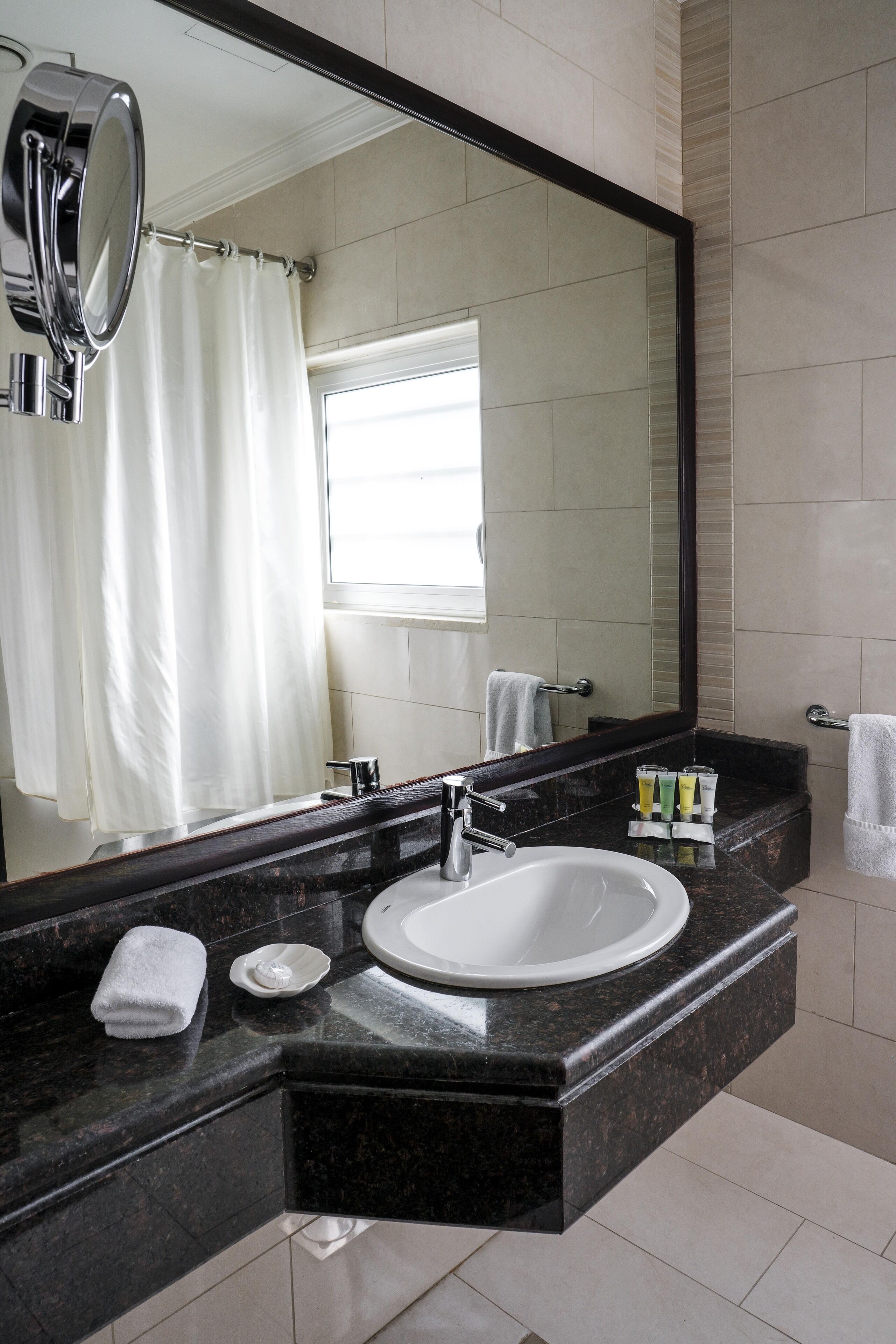 premium room twin bed | bathroom | free toiletries, towels