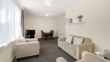 Family Suite, 2 Bedrooms | Living area | TV