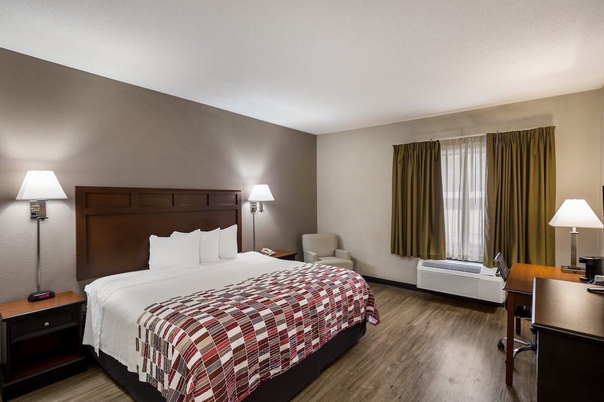 Superior Room, 1 King Bed, Non Smoking | 1 bedroom, desk, blackout drapes, iron/ironing board