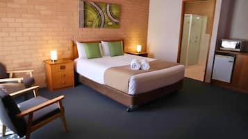 Premium bedding, Tempur-Pedic beds, desk, laptop workspace