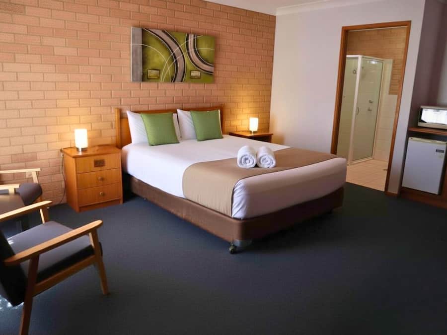 Premium bedding, Tempur-Pedic beds, desk, laptop workspace