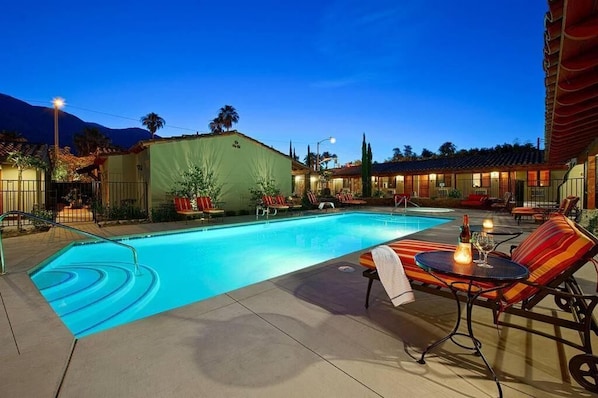 Outdoor pool, open 9:00 AM to 9:00 PM, pool umbrellas, sun loungers