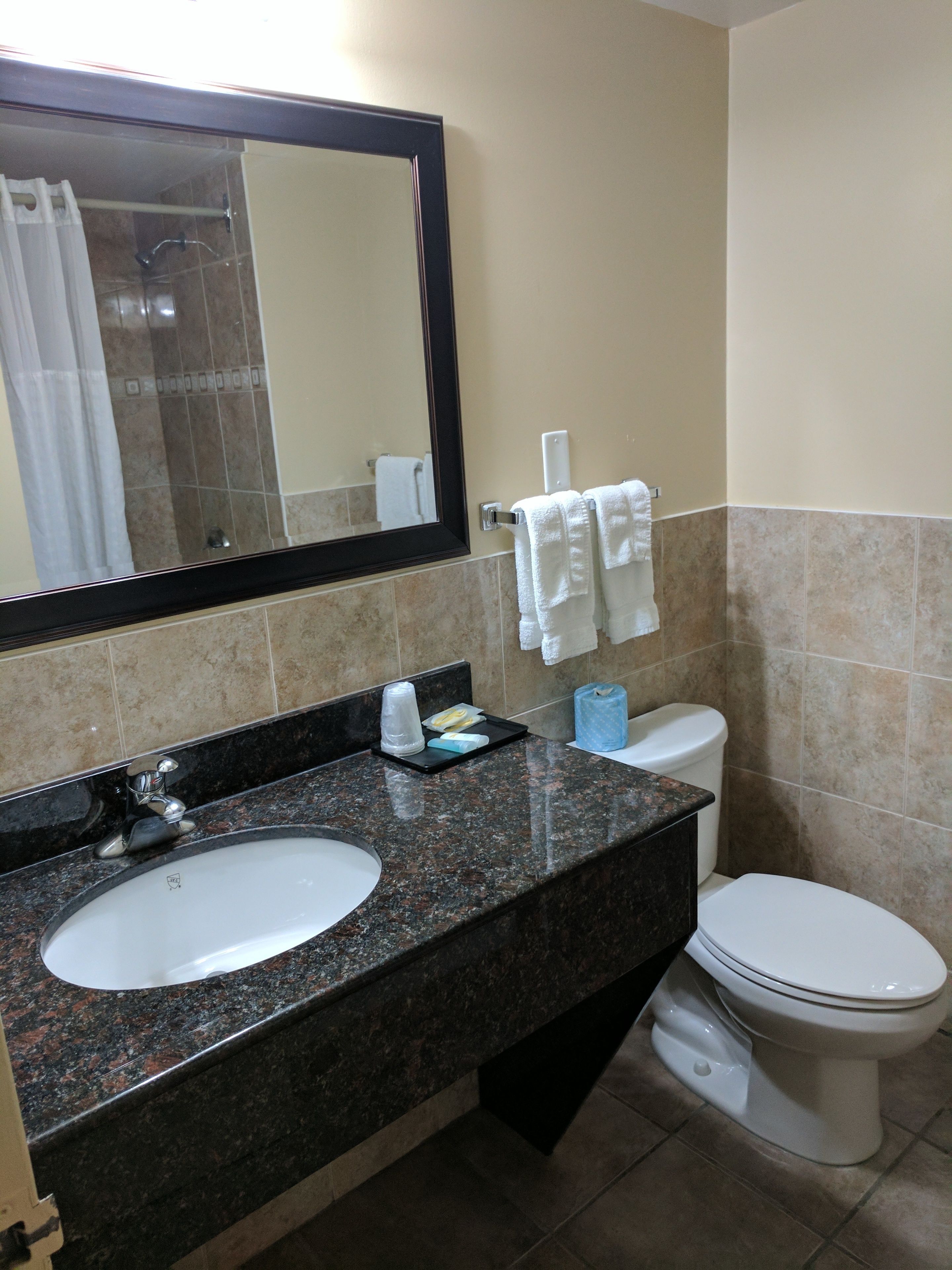 deep-soaking bathtub, hair dryer, towels