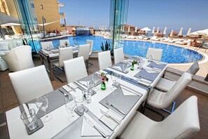 Breakfast, lunch served; Mediterranean cuisine, pool views 