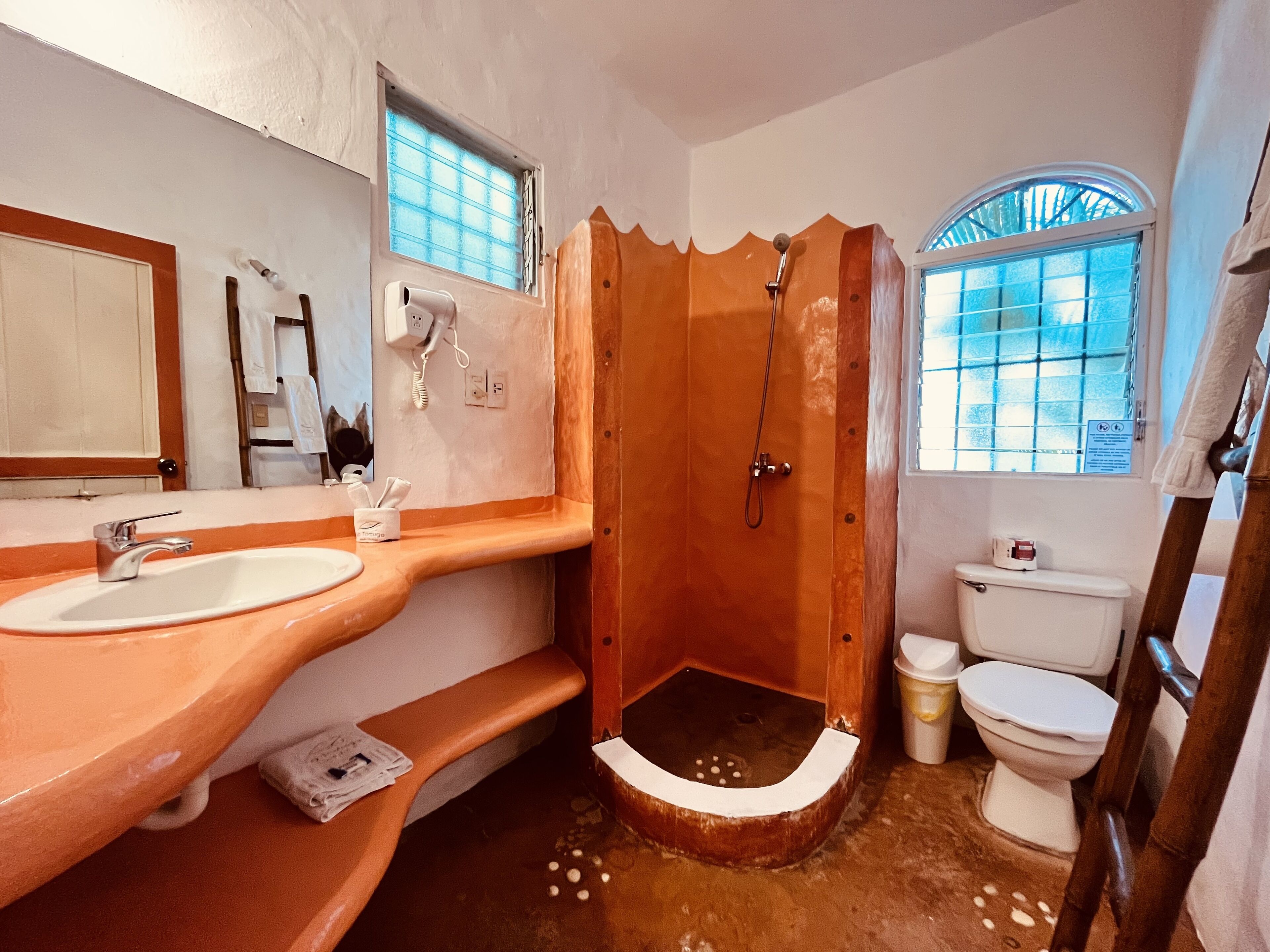 junior suite | bathroom | shower, hair dryer, towels