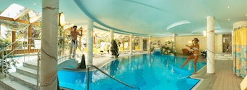 Indoor pool, seasonal outdoor pool, pool umbrellas, sun loungers