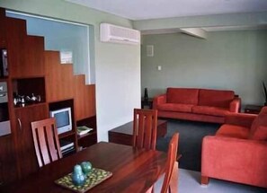 Standard Villa, 2 Bedrooms, Non Smoking, Kitchen | Living room | 72-inch flat-screen TV with digital channels, TV, DVD player
