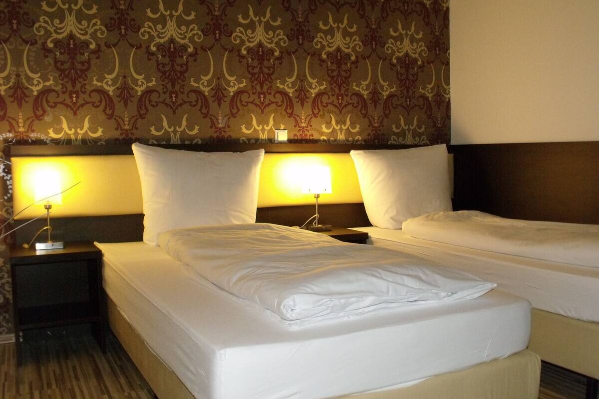 double room, private bathroom | premium bedding, in-room safe, desk, laptop workspace