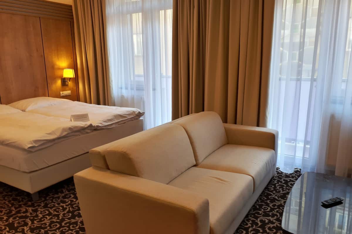 Deluxe Double Room, 1 Bedroom | Living room | 55-inch flat-screen TV with digital channels, TV