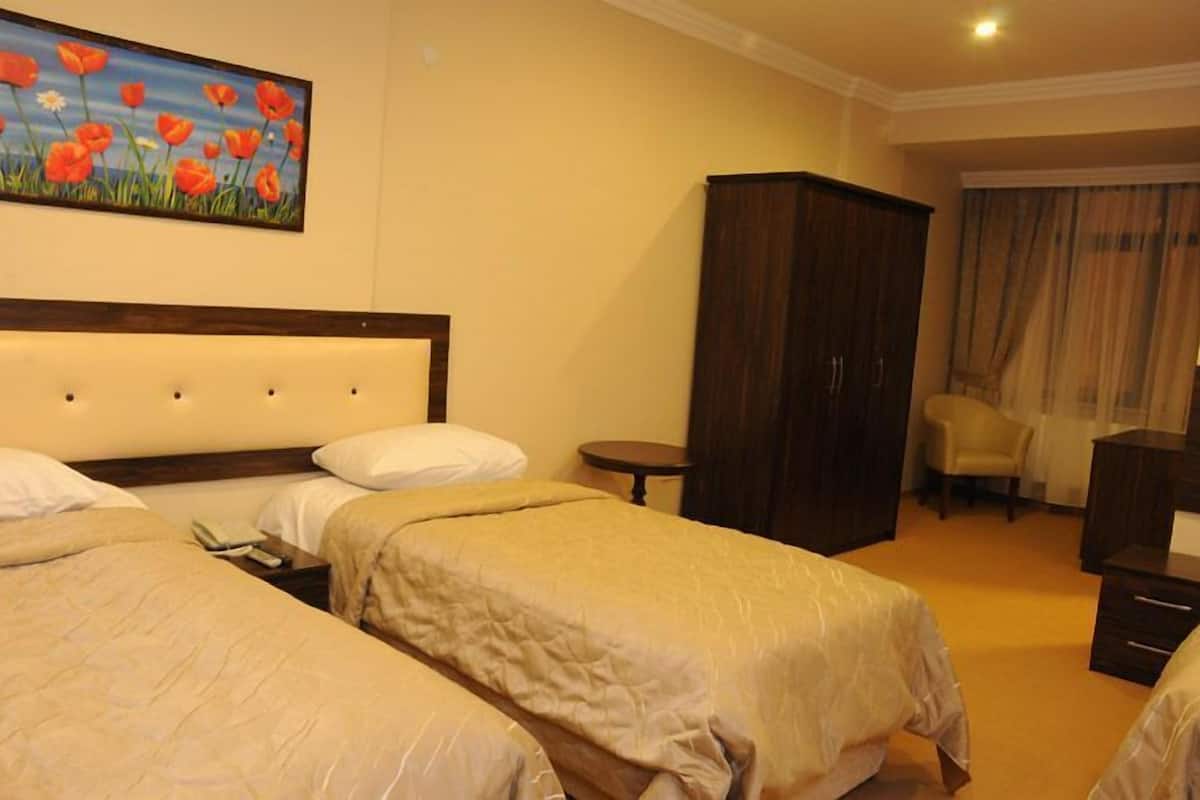 Dreibettzimmer