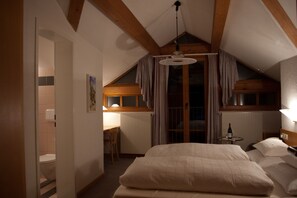 Premium bedding, down duvets, pillow-top beds, individually furnished