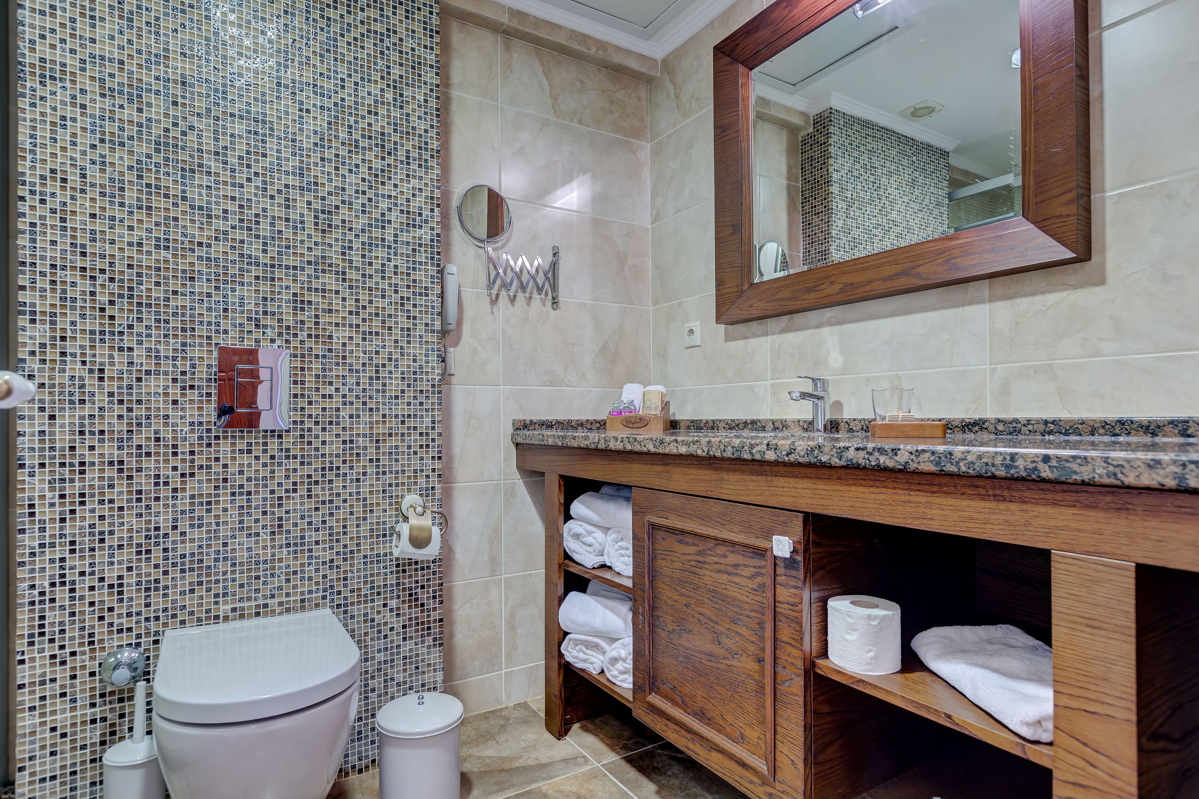 family room | bathroom | shower, rainfall showerhead, eco-friendly toiletries, hair dryer