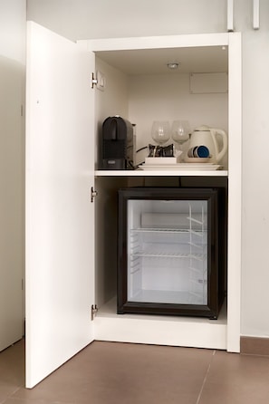 Premium bedding, down duvets, minibar, in-room safe