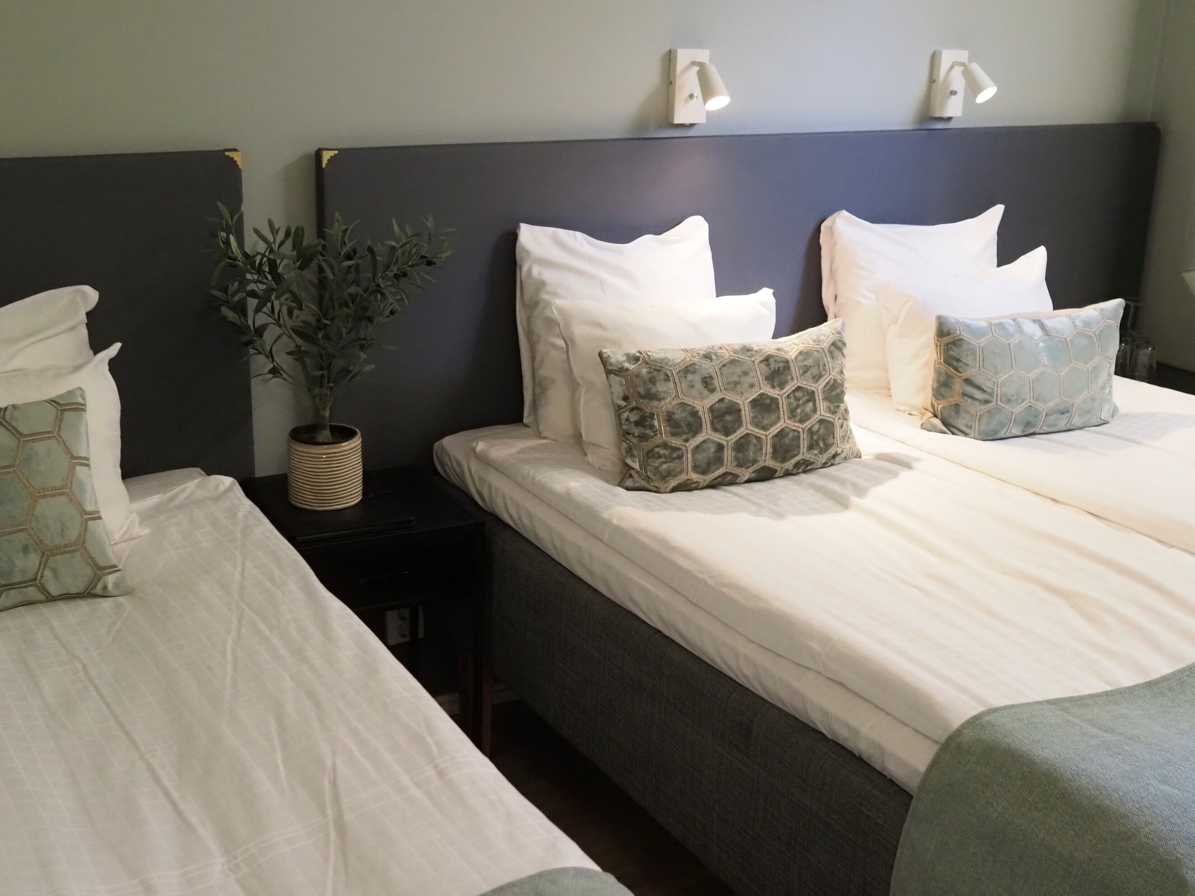 triple room | premium bedding, select comfort beds, desk, blackout curtains