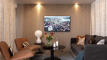 Televisión de pantalla plana de 32 pulgadas con canales por cable