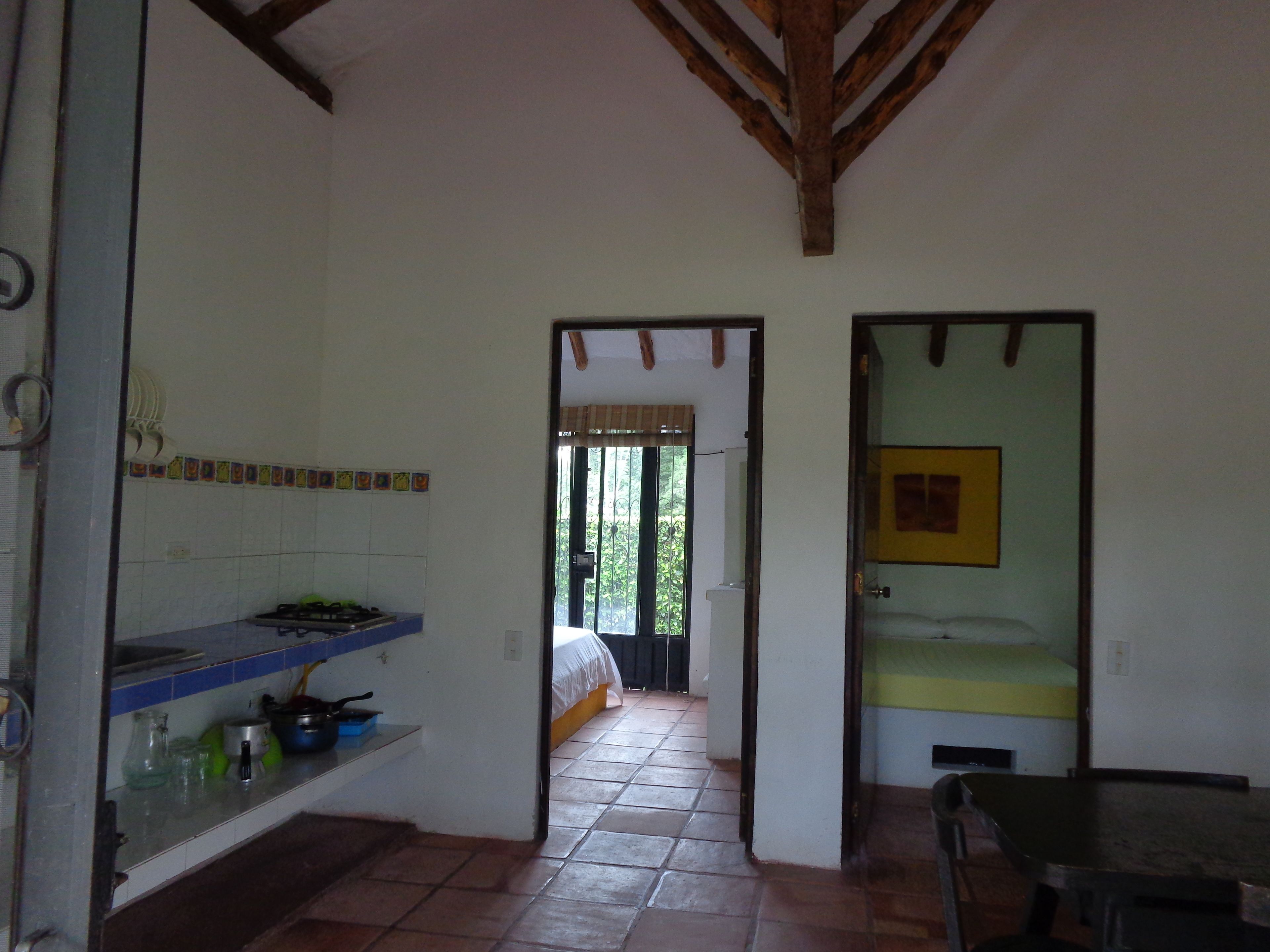 romantic bungalow, 1 king bed, garden view | living area | tv