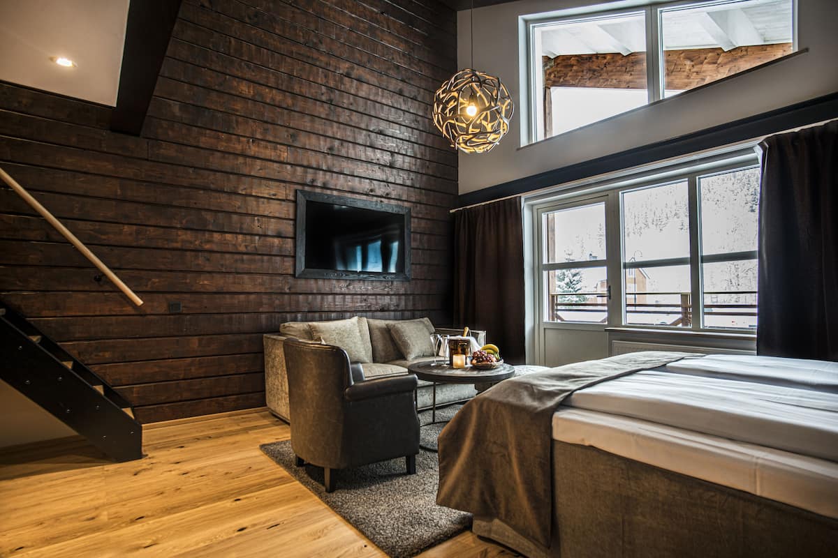 junior suite (incl. spa access) | desk, laptop workspace, blackout curtains, iron/ironing board