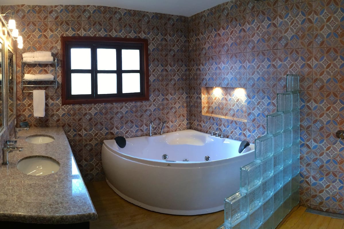 superior room, 1 king bed with sofa bed, hot tub | bathroom | shower, rainfall showerhead, free toiletries, hair dryer