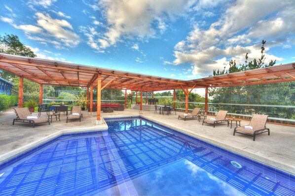 Outdoor pool, pool umbrellas, pool loungers