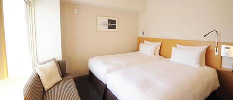 Desk, blackout curtains, soundproofing, free WiFi