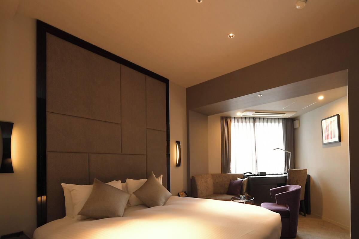 Down comforters, desk, blackout drapes, soundproofing