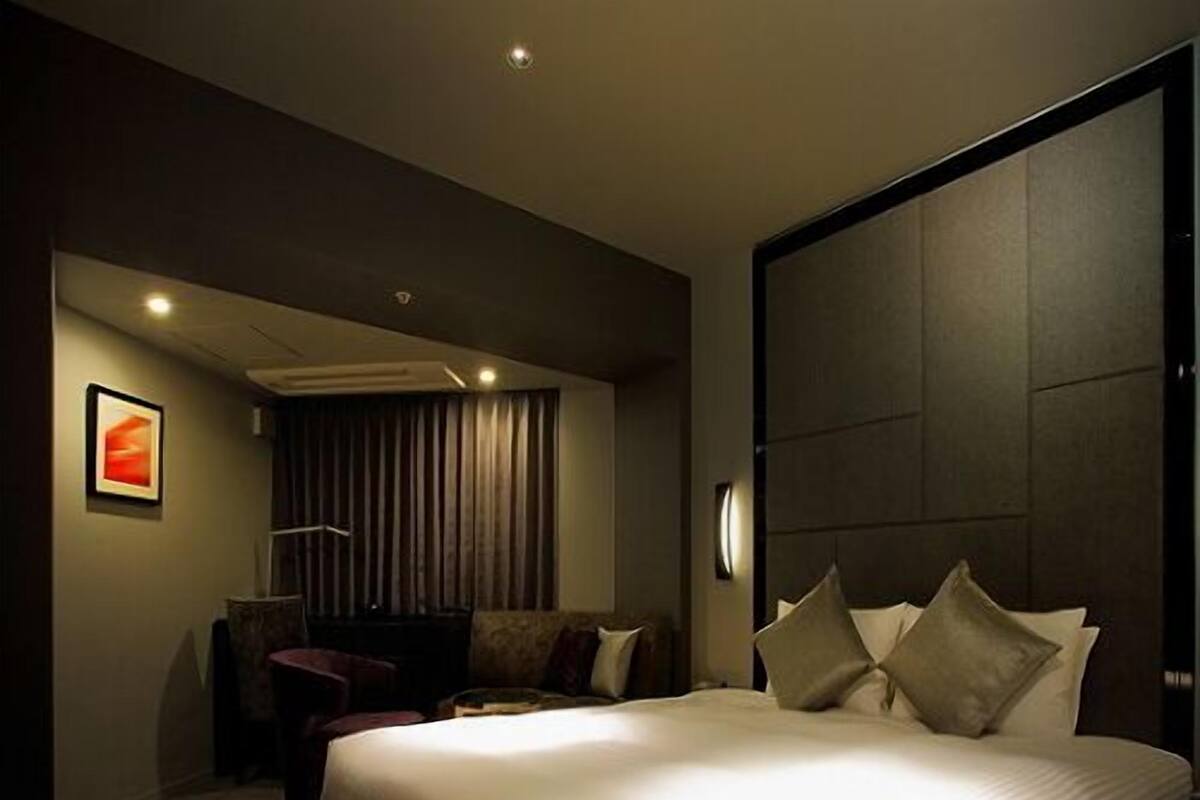 Down comforters, desk, blackout drapes, soundproofing