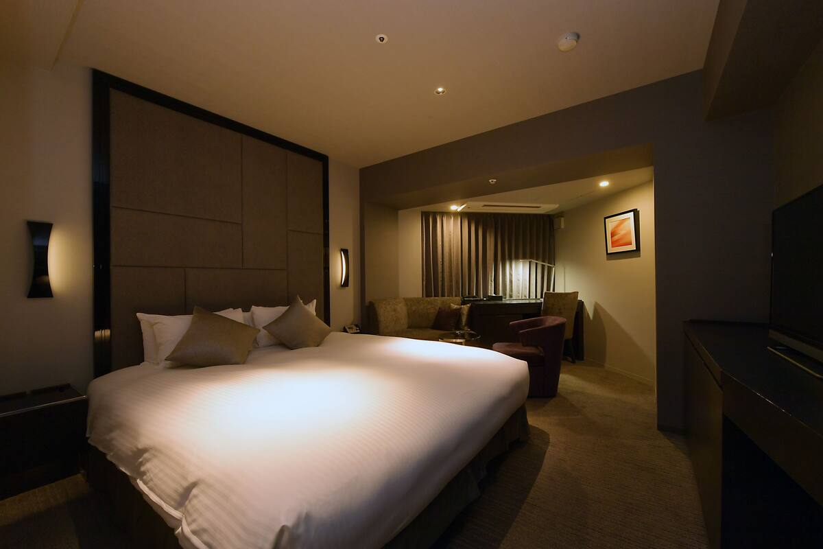 Down comforters, desk, blackout drapes, soundproofing