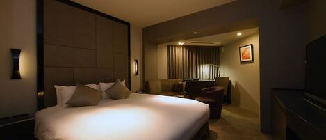 Down comforters, desk, blackout drapes, soundproofing