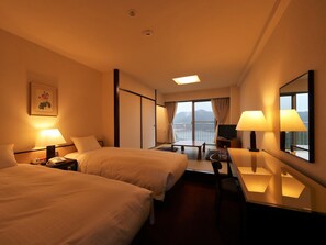 客房内保险箱、遮光窗帘、免费 WiFi、床单