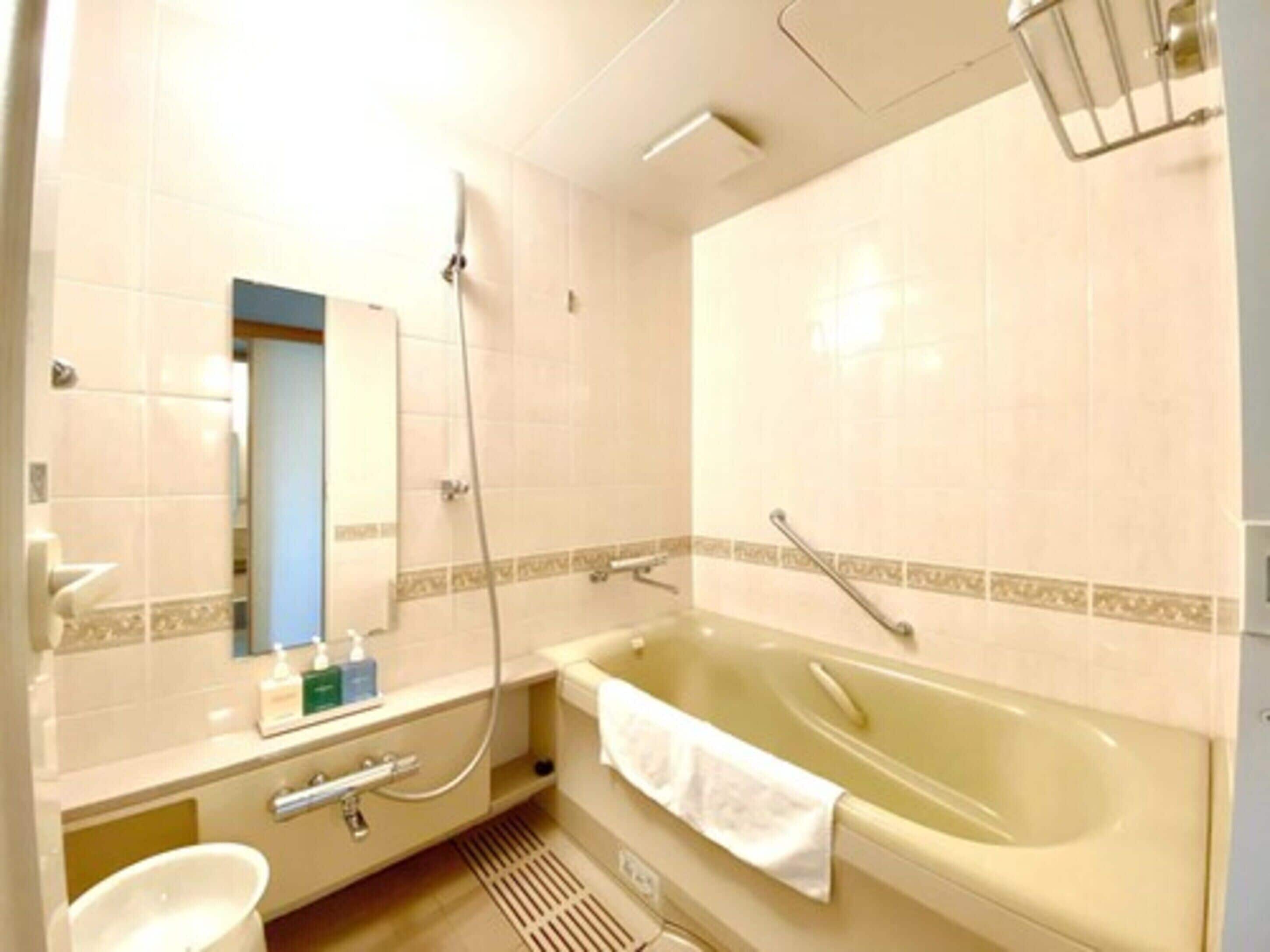 free toiletries, hair dryer, slippers, towels