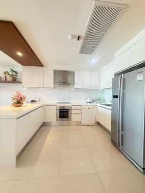 2 Bedroom Penthouse Pool Suite | Private kitchen | Full-size fridge, coffee/tea maker