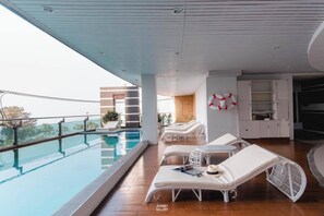 Outdoor pool, sun loungers