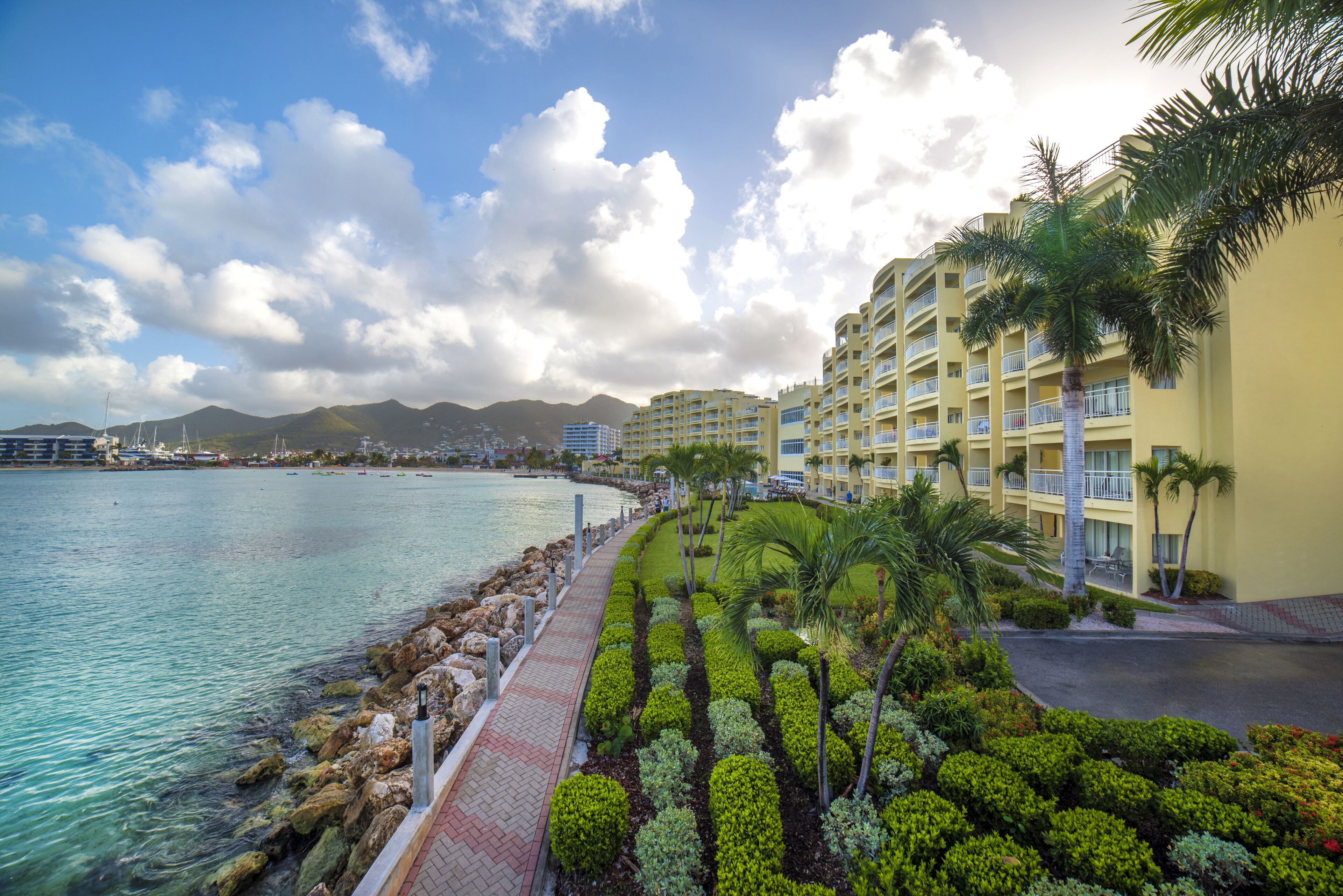 on the beach, sun-loungers, beach umbrellas, beach towels