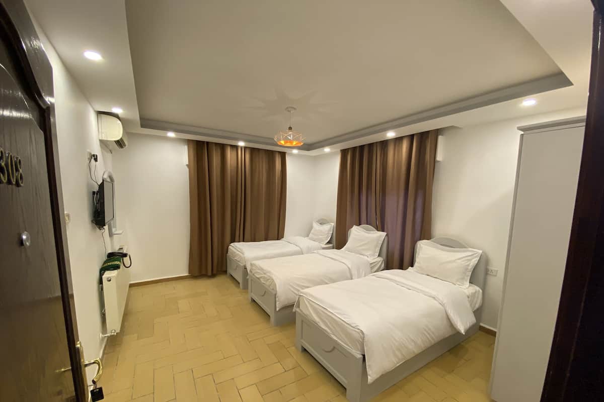 Driepersoonskamer | 4 slaapkamers, lakens van Egyptisch katoen, luxe beddengoed