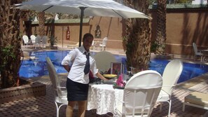 Breakfast, lunch, dinner served; pool views