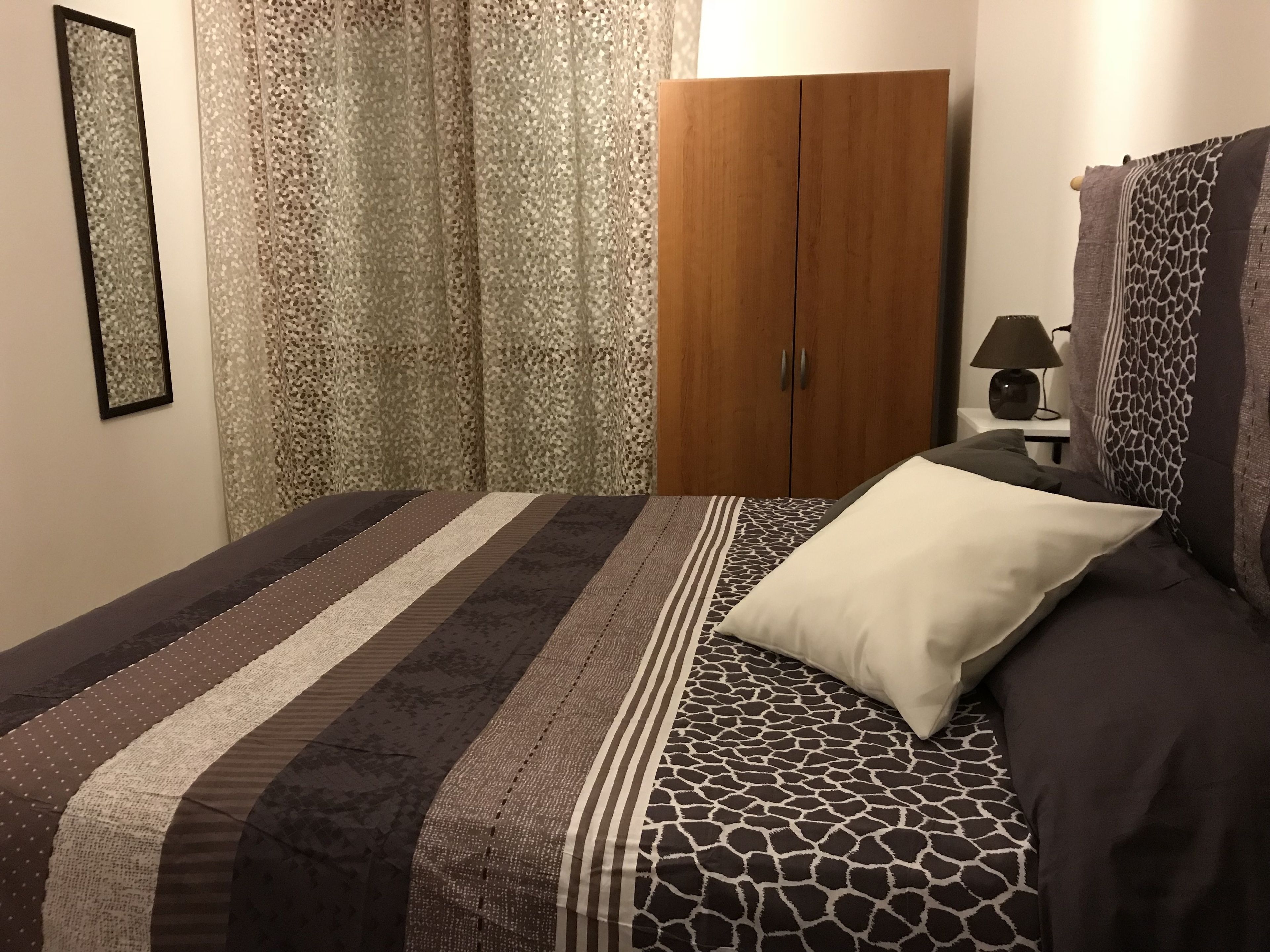 Economy Quadruple Room, Private Bathroom | Down comforters, rollaway beds, free WiFi, bed sheets