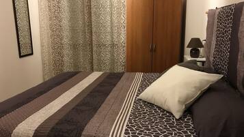 Economy Quadruple Room, Private Bathroom | Down comforters, rollaway beds, free WiFi, bed sheets