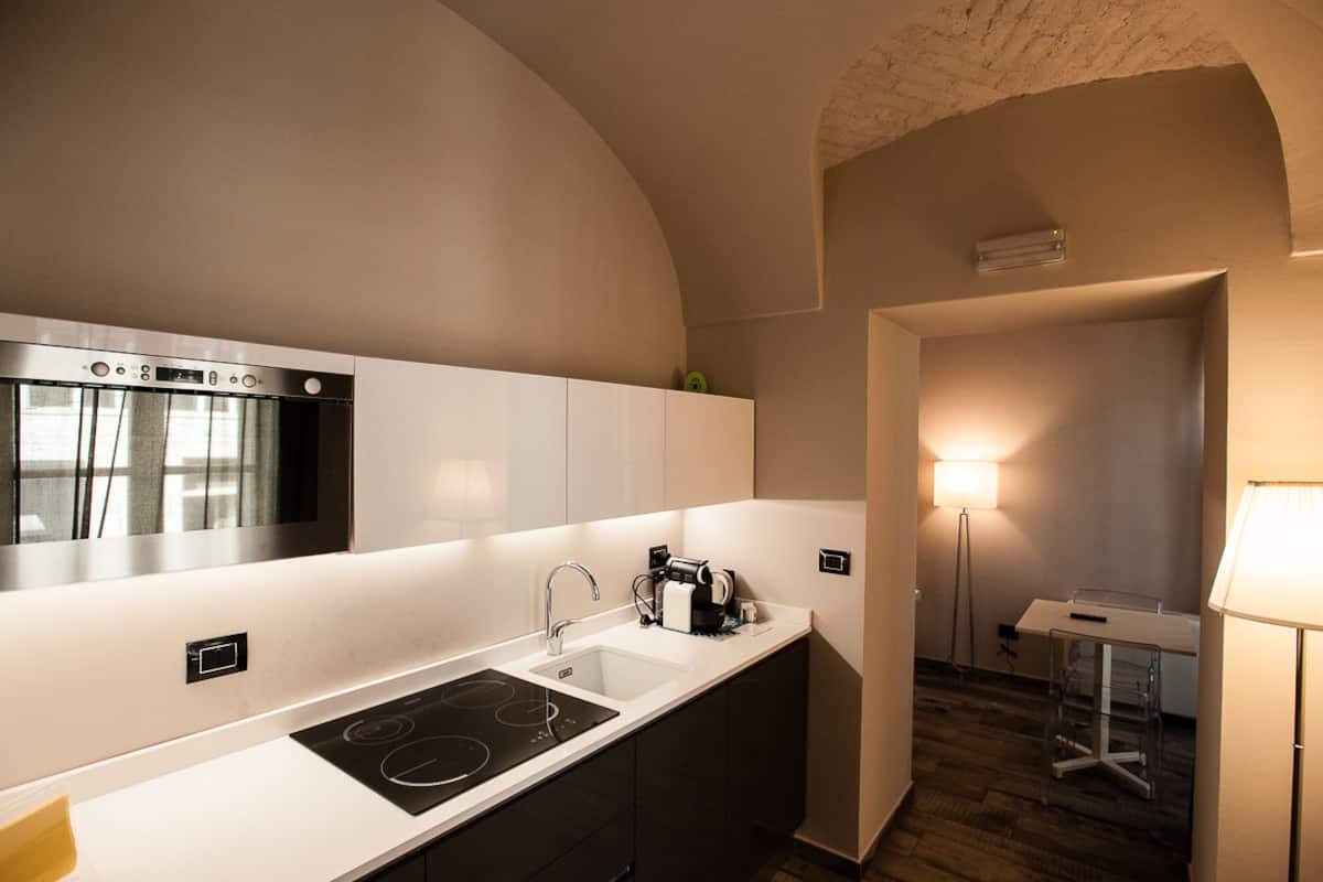 Departamento de lujo | Ropa de cama de alta calidad, edredón, camas Select Comfort y minibar